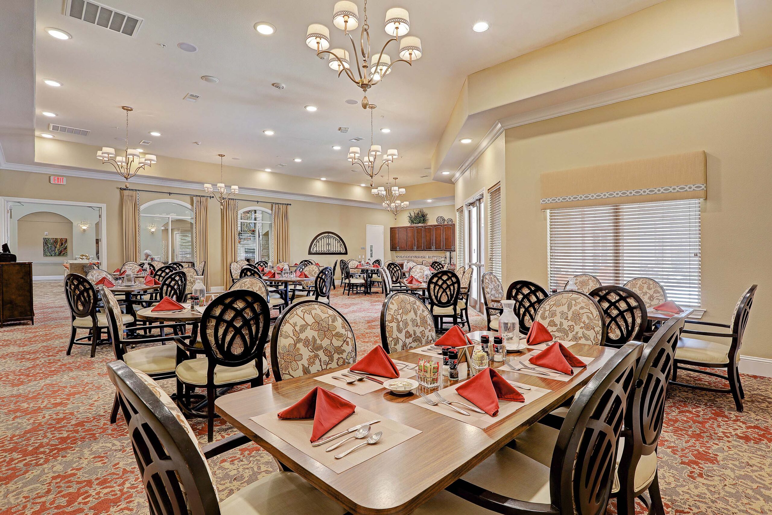 Interior image of Woodhaven Village's dining room at Woodhaven Village, a senior living community near Montgomery, TX.